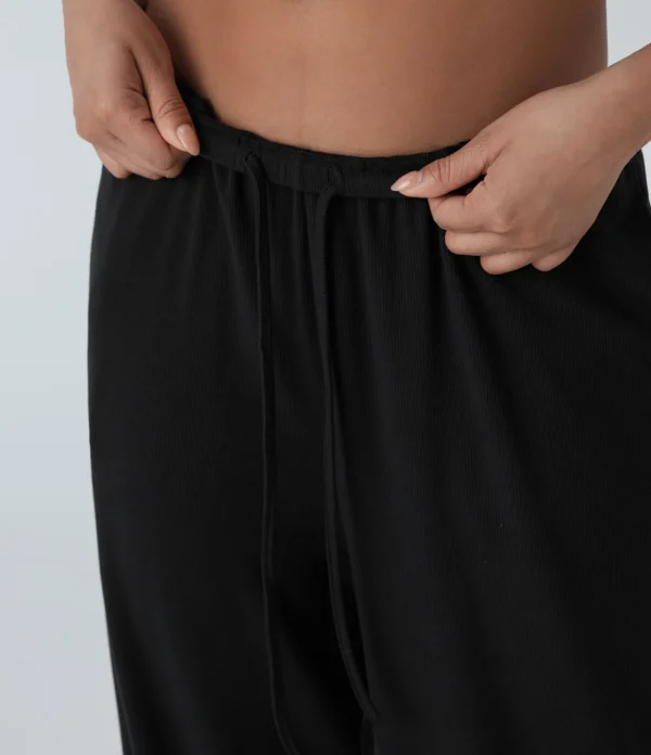 Pantalon baggy femme noir fluide ample avec cordon et poches