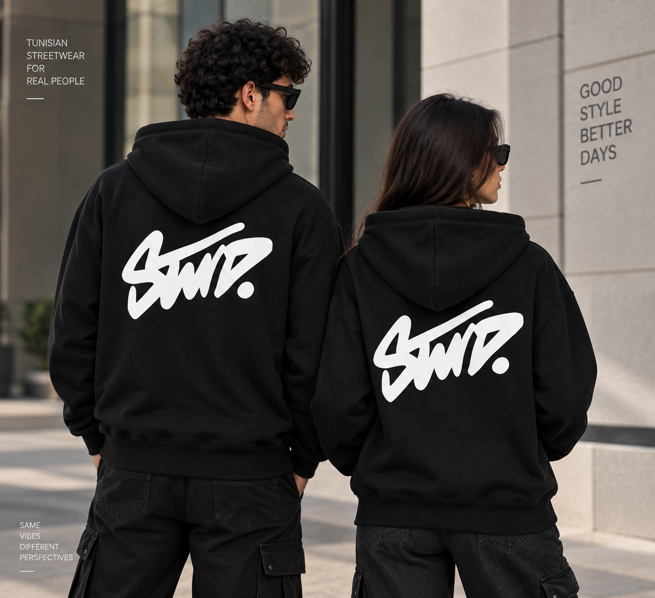 Sweat à capuche SWTD noir avec fermeture porté par un homme et une femme.